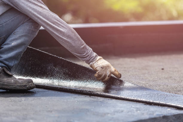 Professional Basement Waterproofing technician working in Harrodsburg, KY